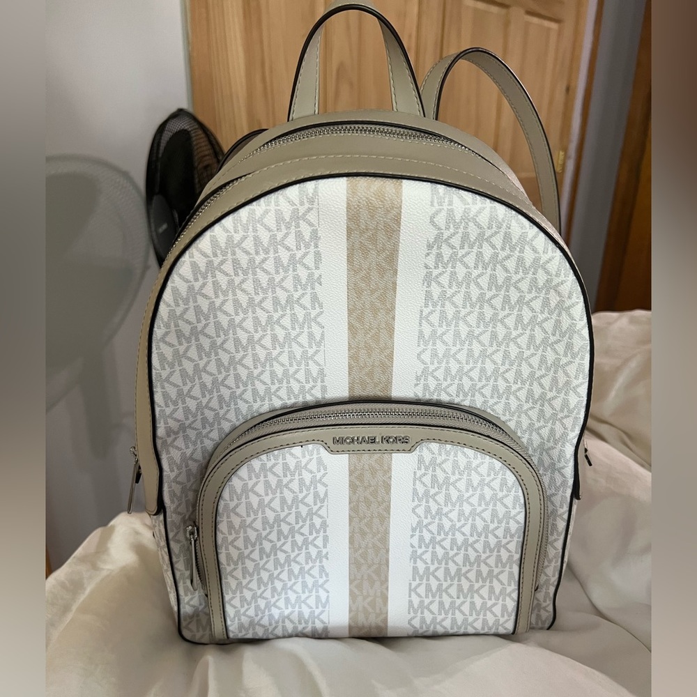 Michael Kors tan/sand medium sized backpack